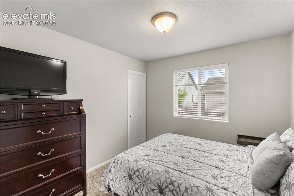 Image 15 of 34: Upstairs bedroom