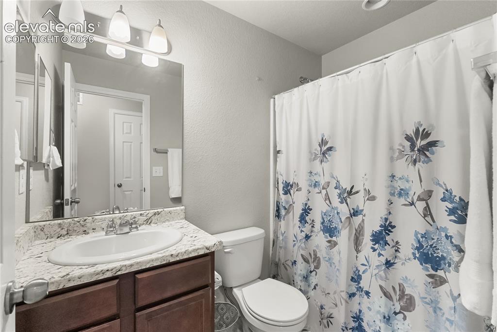 Image 16 of 34: Upstairs bathroom