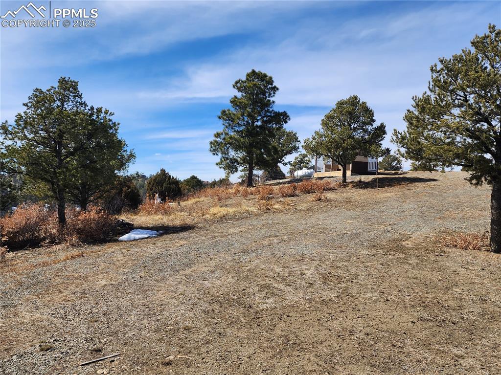 Image 15 of 23: View of yard with a rural view
