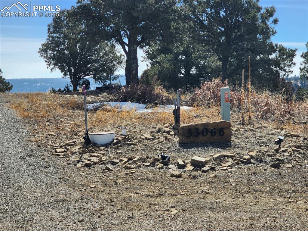 Image 2 of 23: View of yard with a water view