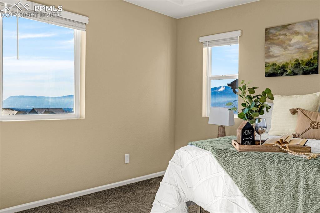 Image 12 of 46: Pikes Peak and Garden of the Gods View From Primary Bedroom
