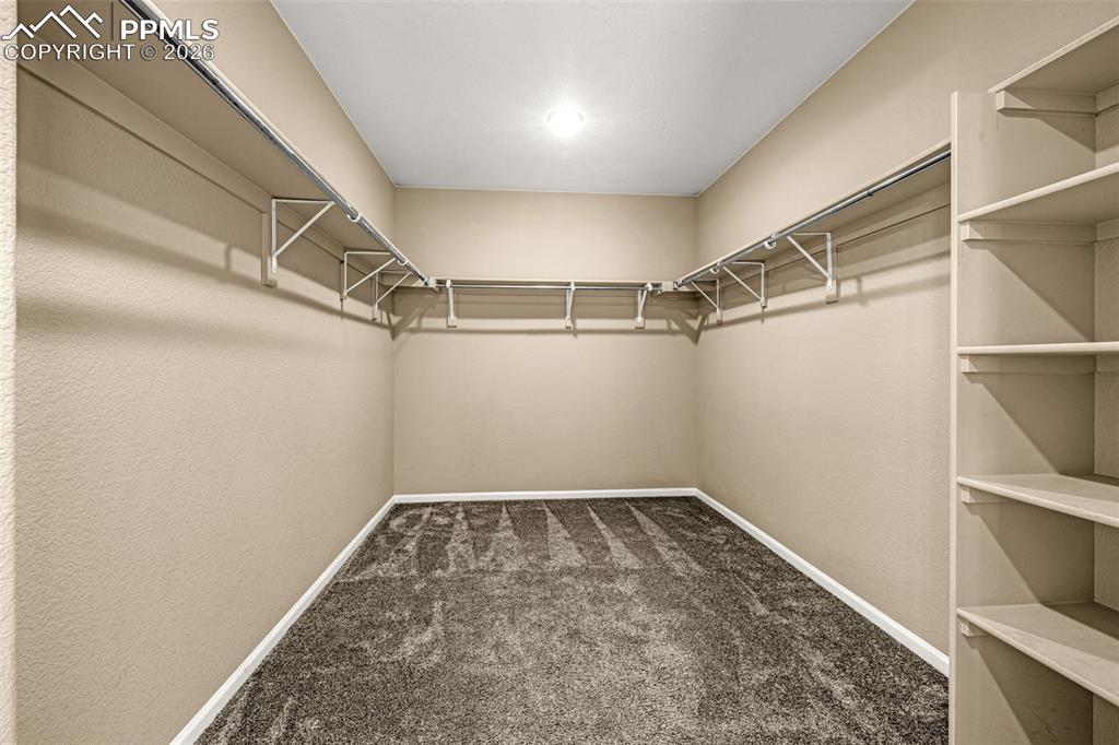 Image 28 of 46: Primary Closet