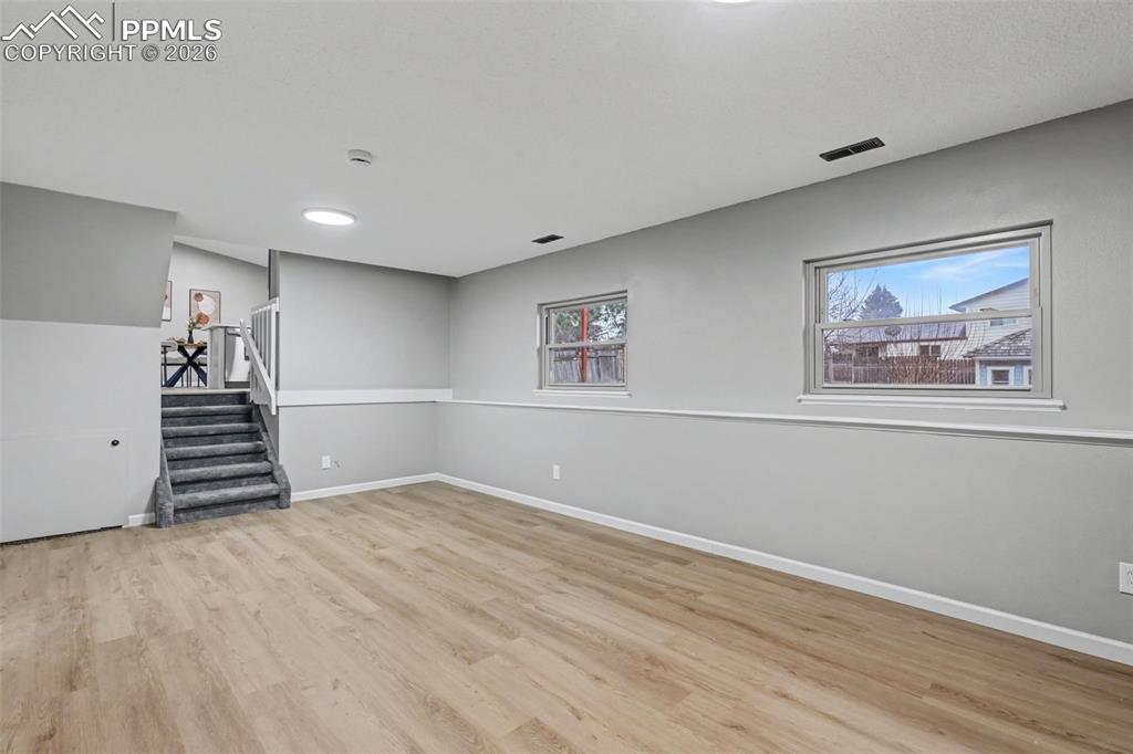 Image 11 of 28: Family room on lower level