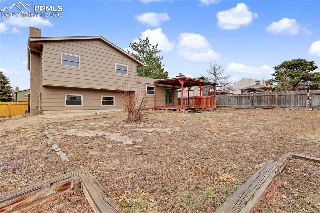 Image 28 of 28: Fully fenced backyard