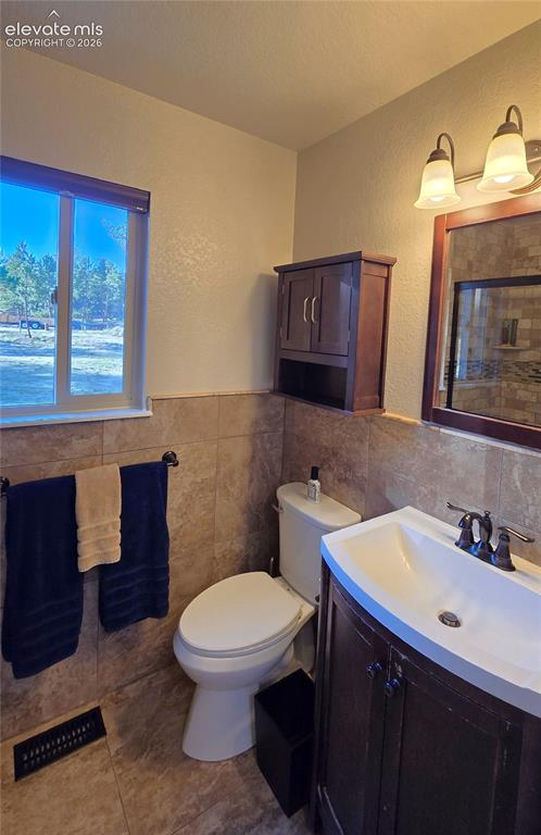 Image 24 of 46: 2nd bath main floor