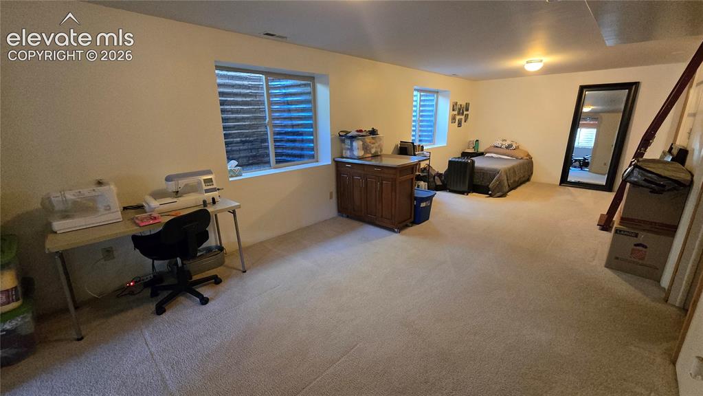 Image 41 of 46: basement bedroom
