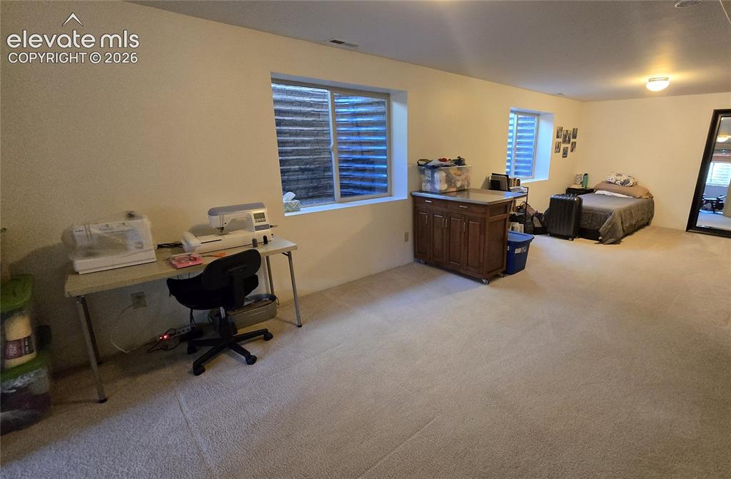 Image 42 of 46: basement bedroom