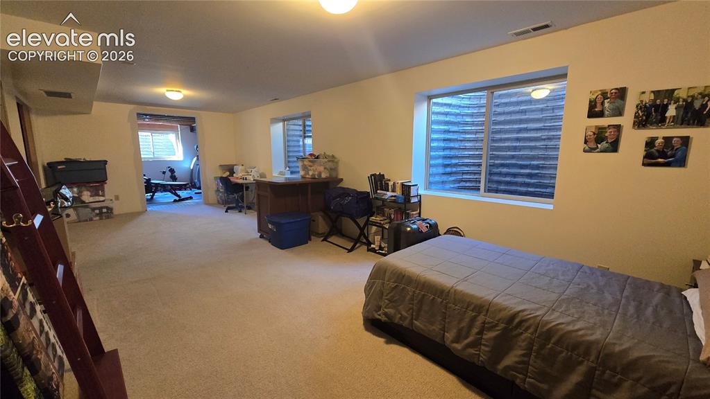 Image 43 of 46: basement bedroom