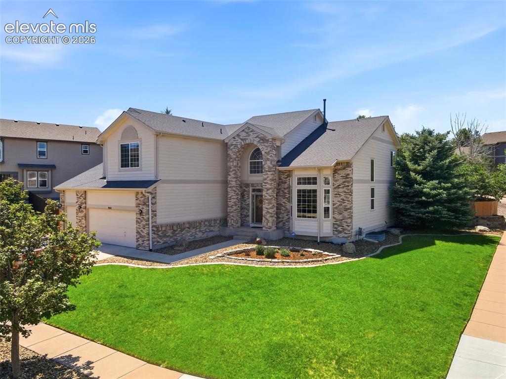 Image 1 of 50: Large 1/3 acre corner lot with beautiful landscaping