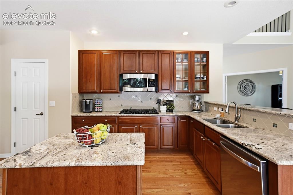 Image 11 of 50: Abundant counter space and kitchen pantry