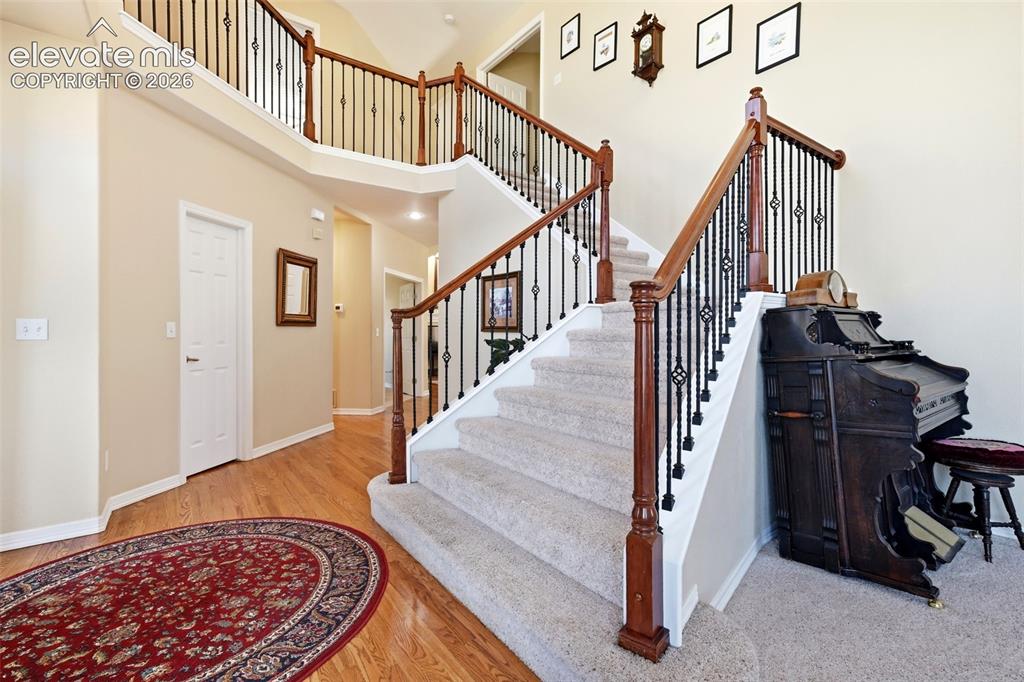Image 5 of 50: Stairs to upper level