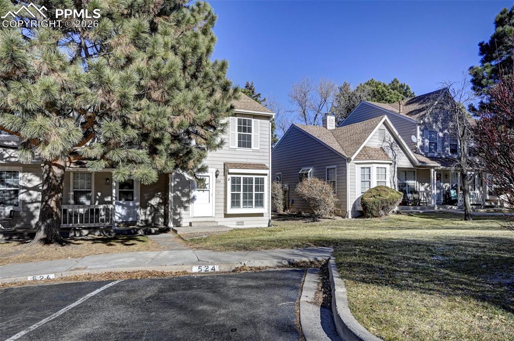 Image 2 of 31: Reserved parking conveniently located in front of the unit.