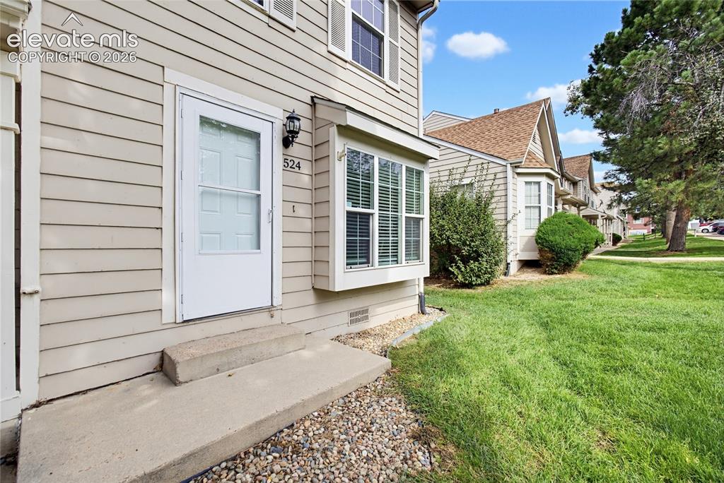 Image 2 of 31: Front Entry with storm door.