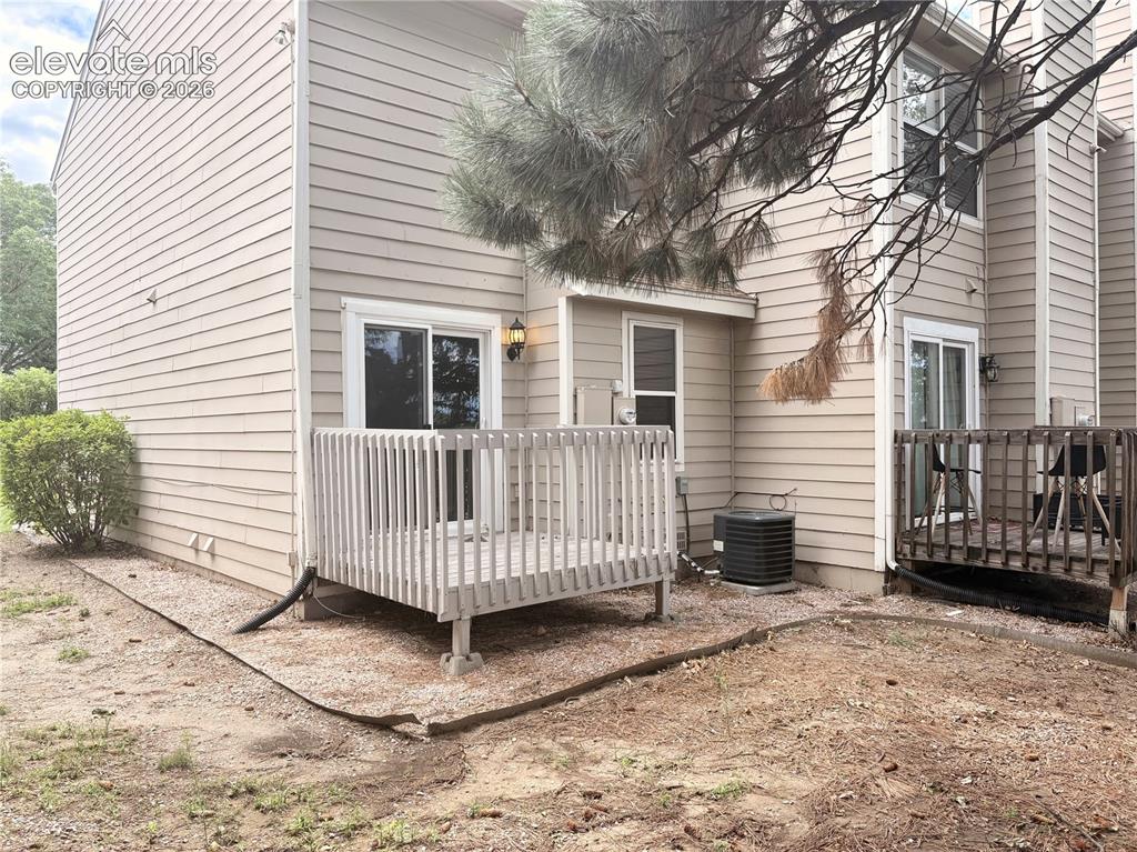 Image 28 of 31: Backyard deck to relax and enjoy the fresh Colorado air.