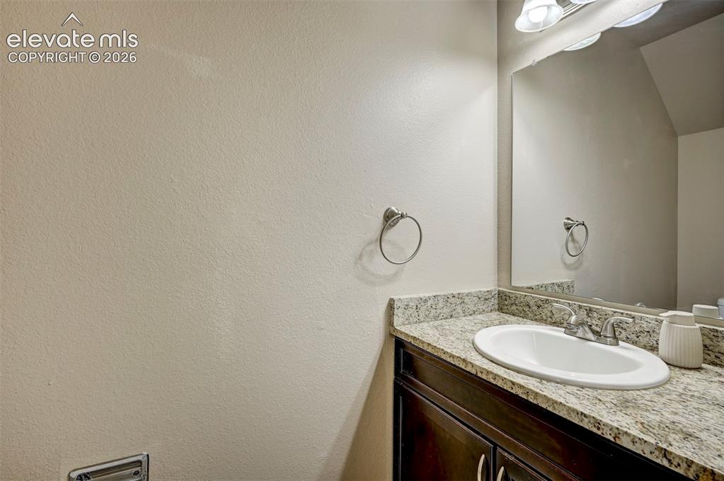 Image 6 of 31: Main Level Powder Bathroom