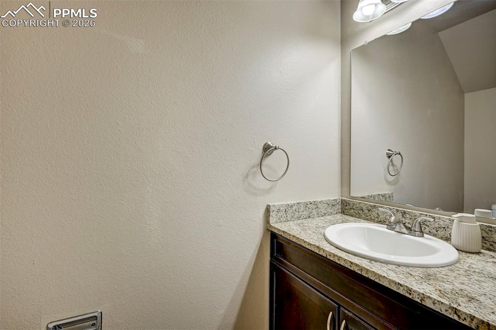 Image 9 of 31: Main Level Powder Bathroom