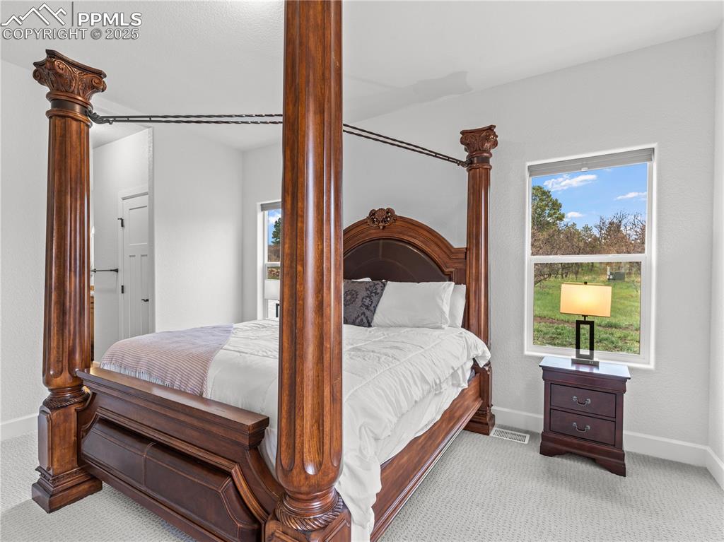 Image 12 of 34: Master Bedroom