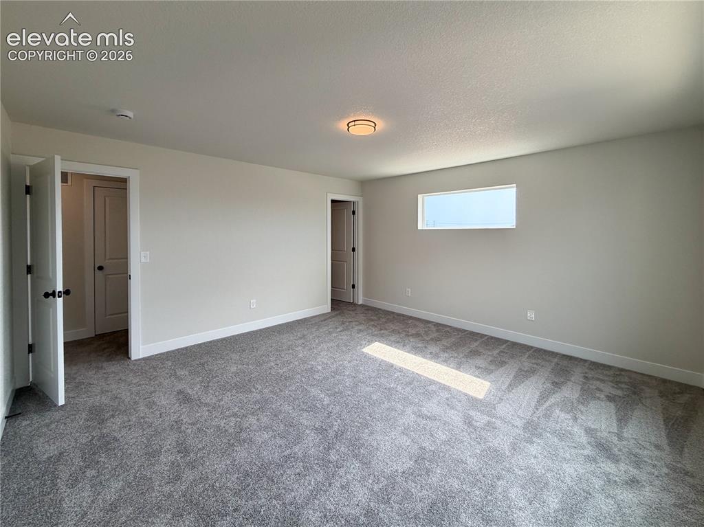 Image 24 of 40: Master Bedroom