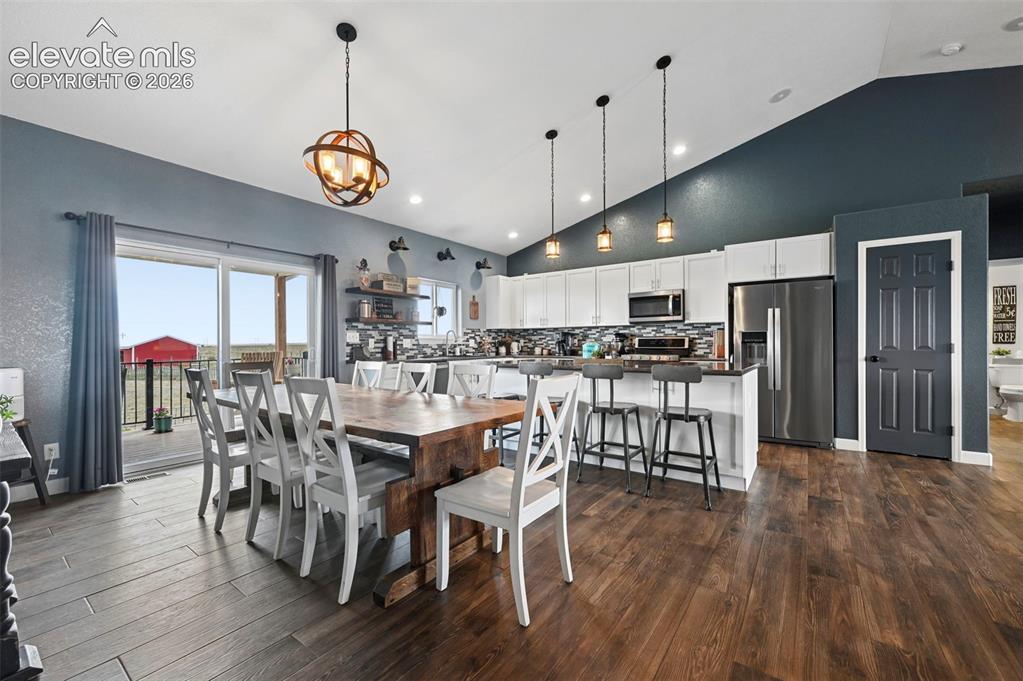 Image 10 of 50: Dining area and Kitchen