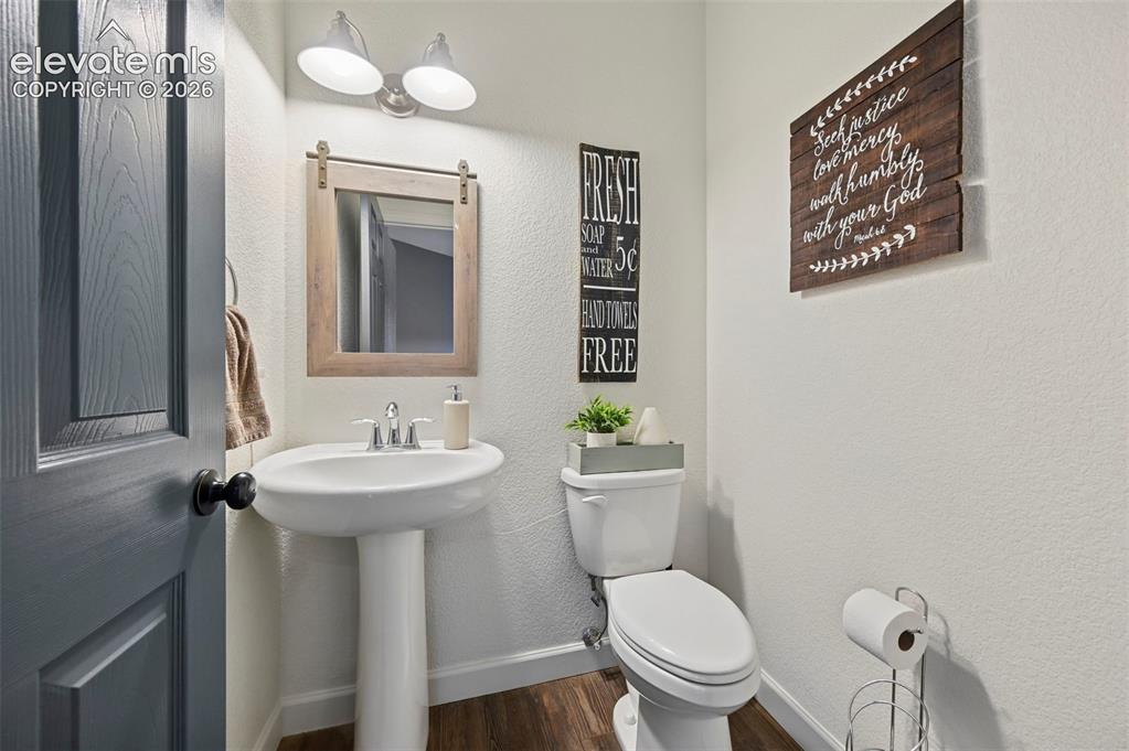 Image 16 of 50: Half Bathroom on main floor