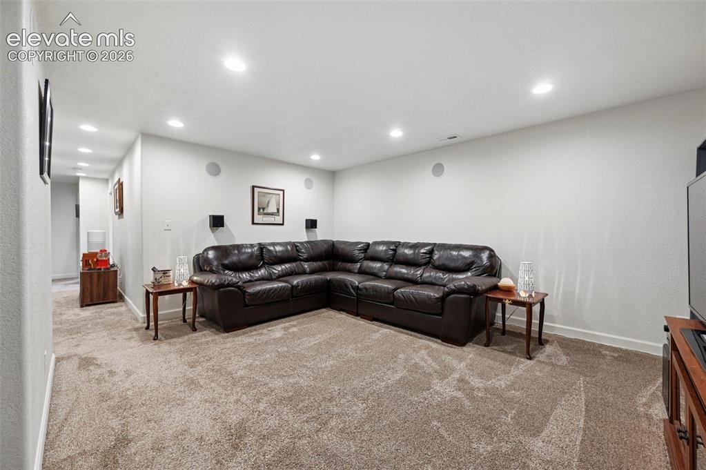 Image 36 of 50: Large Family Room in Basement