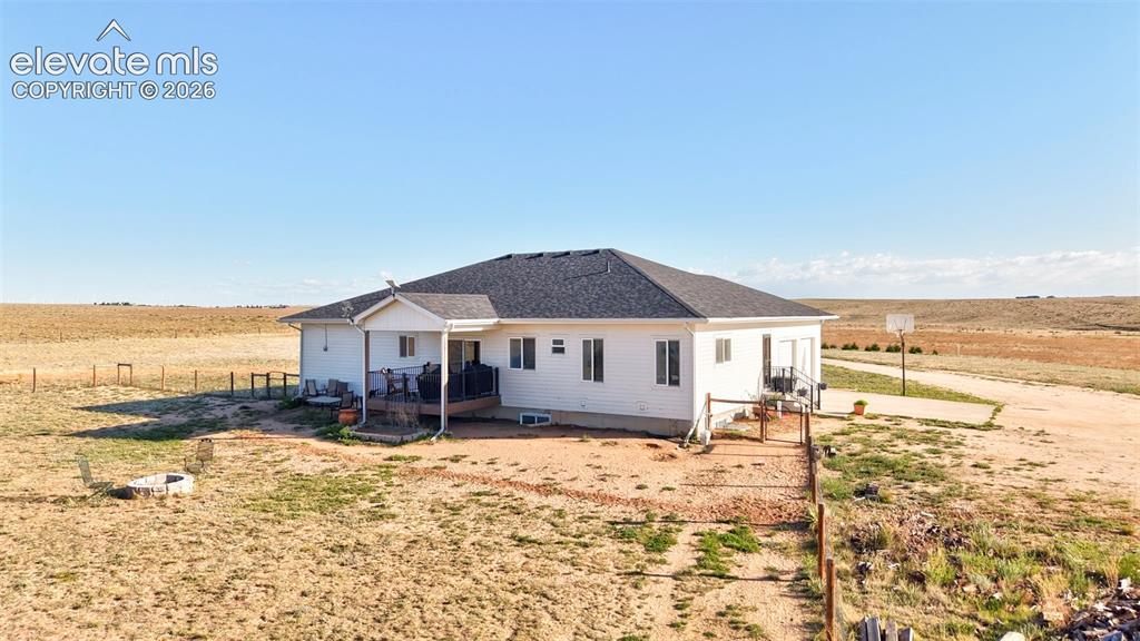 Image 41 of 50: Back of house with covered front porch