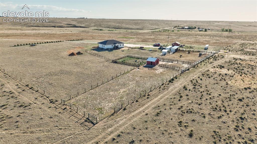 Image 47 of 50: Aerial View of Back of Home