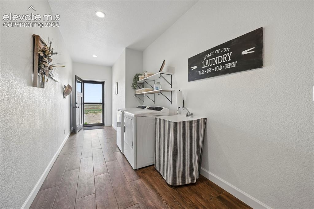 Image 5 of 50: Mud Room with exterior and garage access
