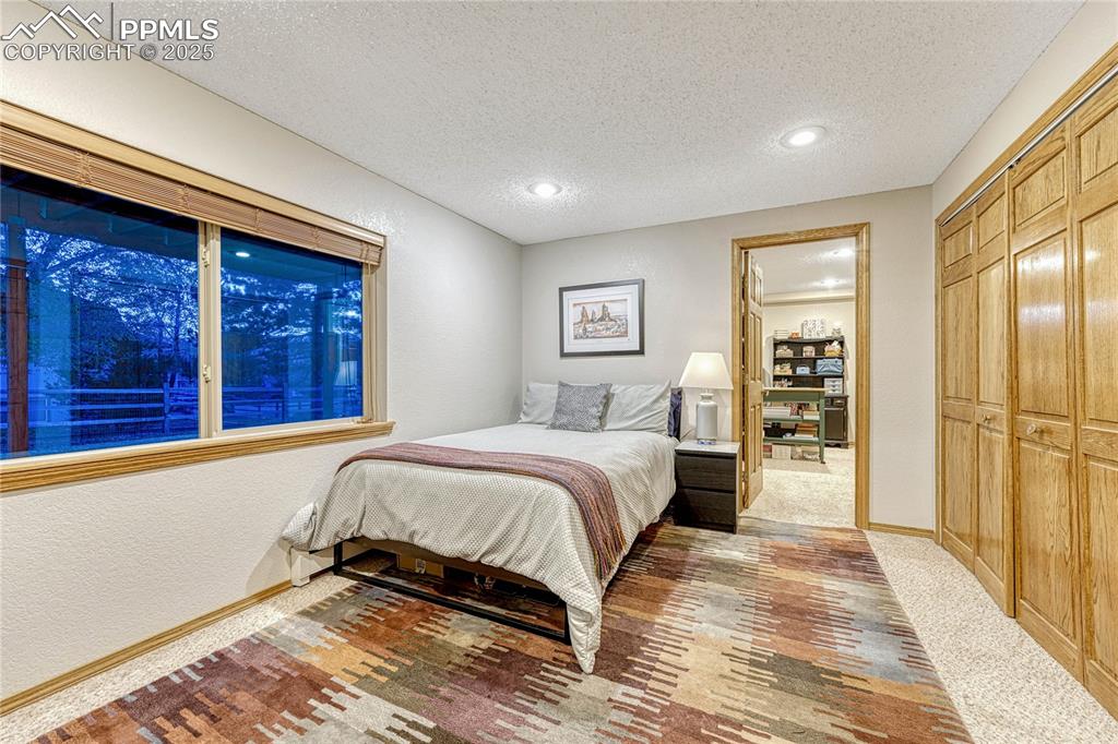 Image 35 of 48: Basement bedroom