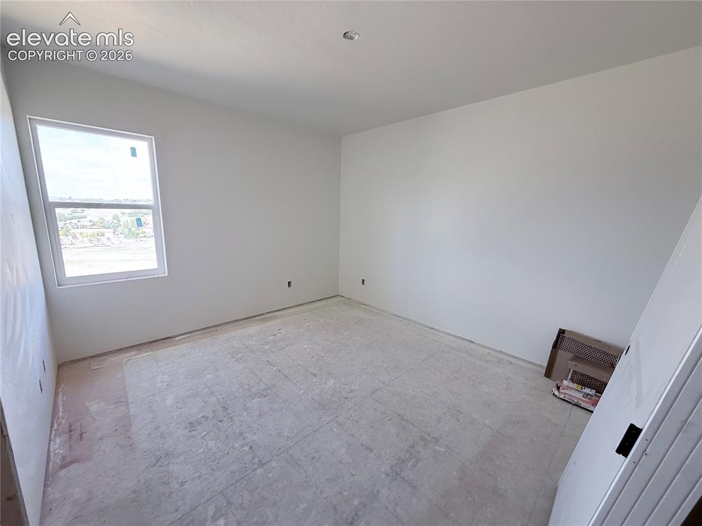 Image 13 of 47: Bedroom 2 is a Jr. Suite with Private Full Bath located on the Main Level