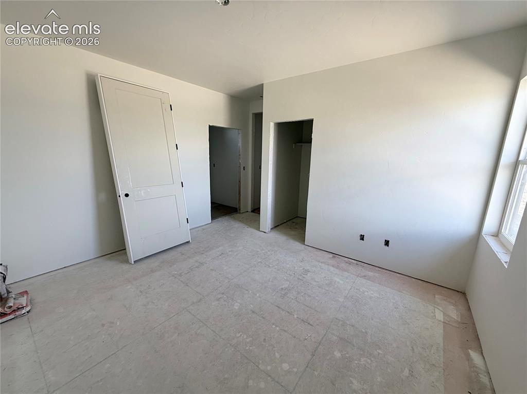 Image 14 of 47: Bedroom 2 is a Jr. Suite with Private Full Bath located on the Main Level