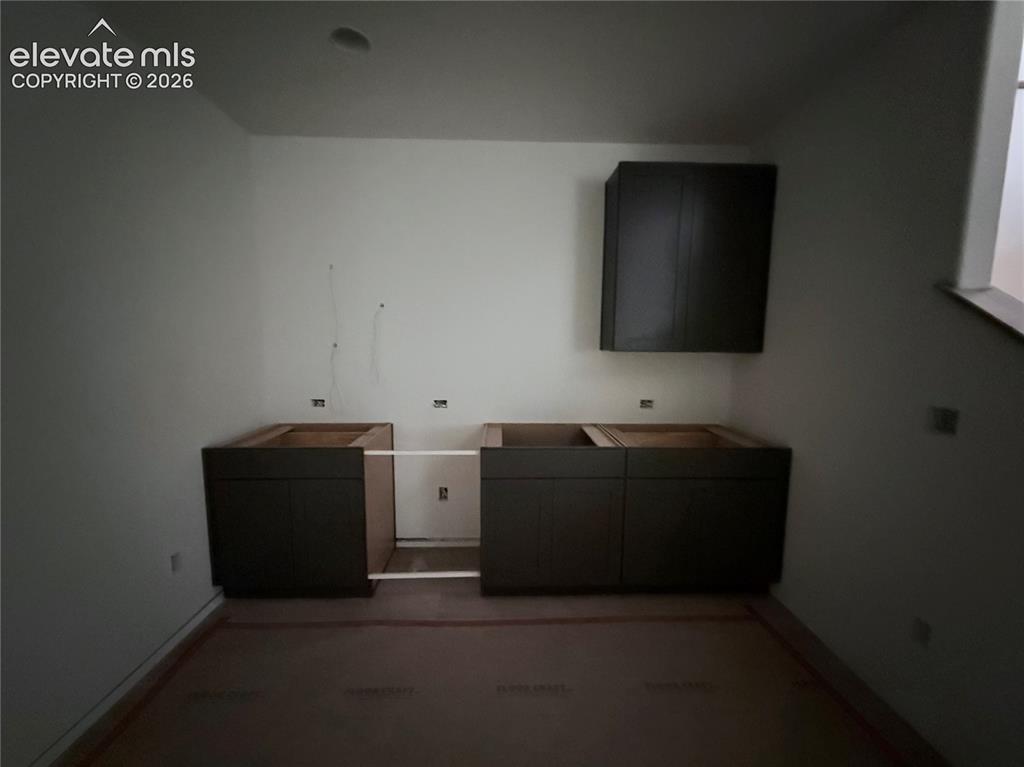 Image 23 of 47: Wet Bar in the Basement Rec Room
