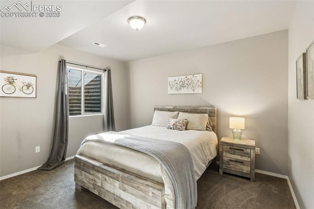 Image 33 of 39: Bedroom