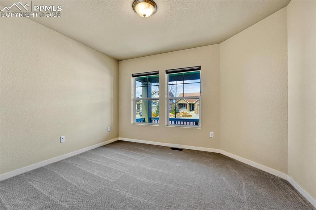 Image 13 of 50: Main level bedroom