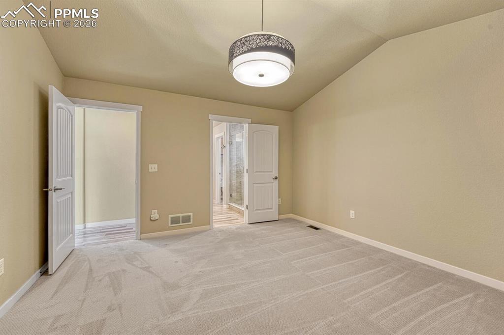 Image 47 of 50: Master Bedroom