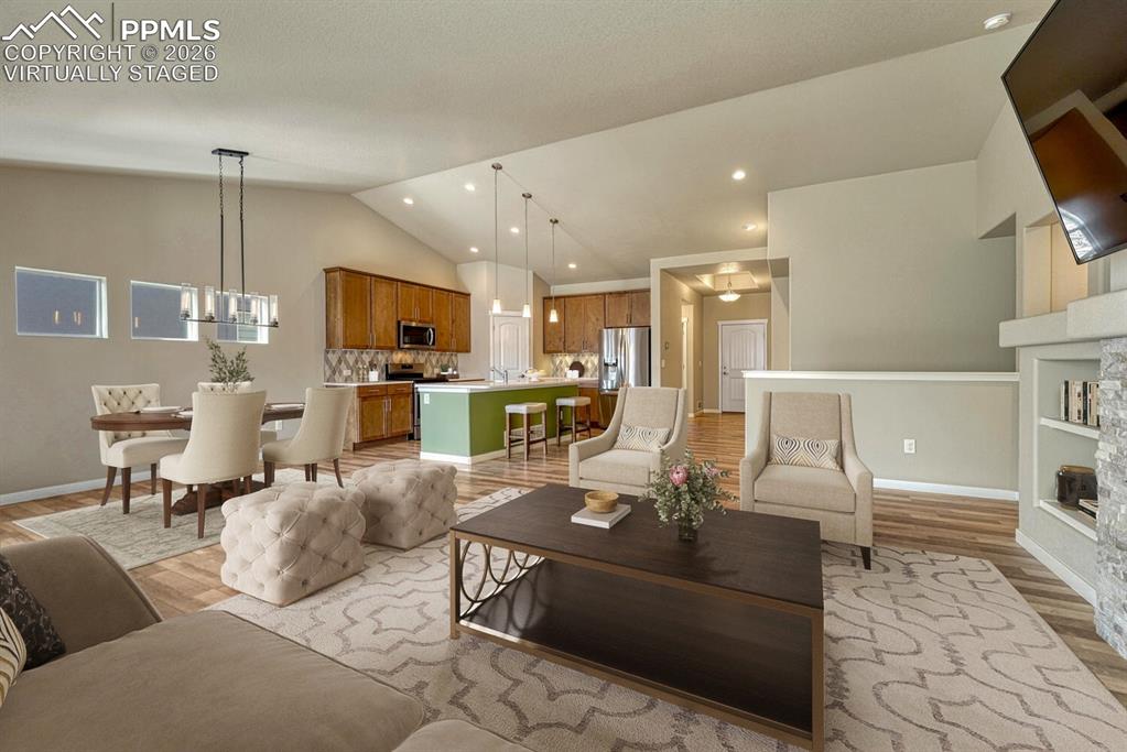 Image 5 of 50: Great room virtually staged