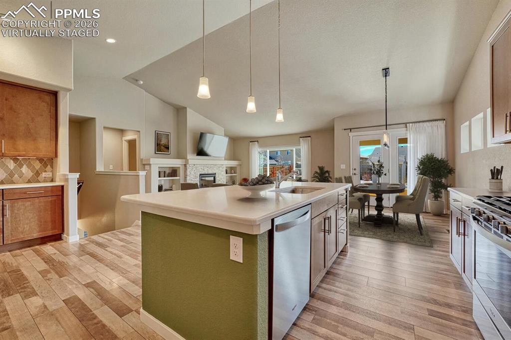 Image 8 of 50: Great room virtually staged