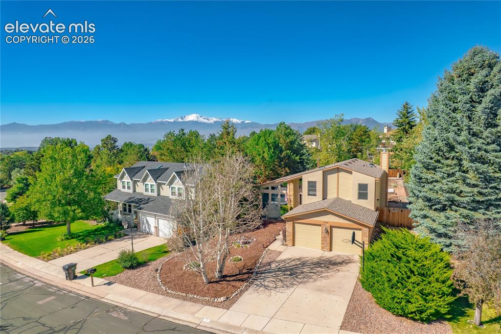 Caption: Two-story residence with a two-car garage