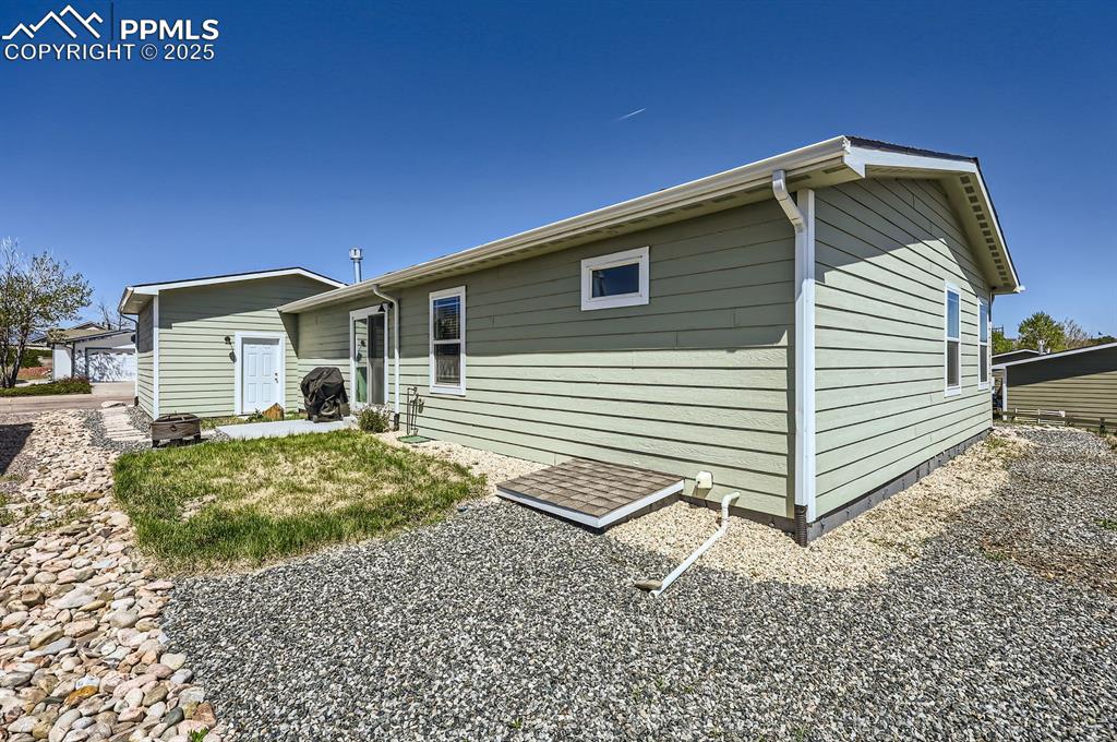 Image 28 of 28: Rear view of house