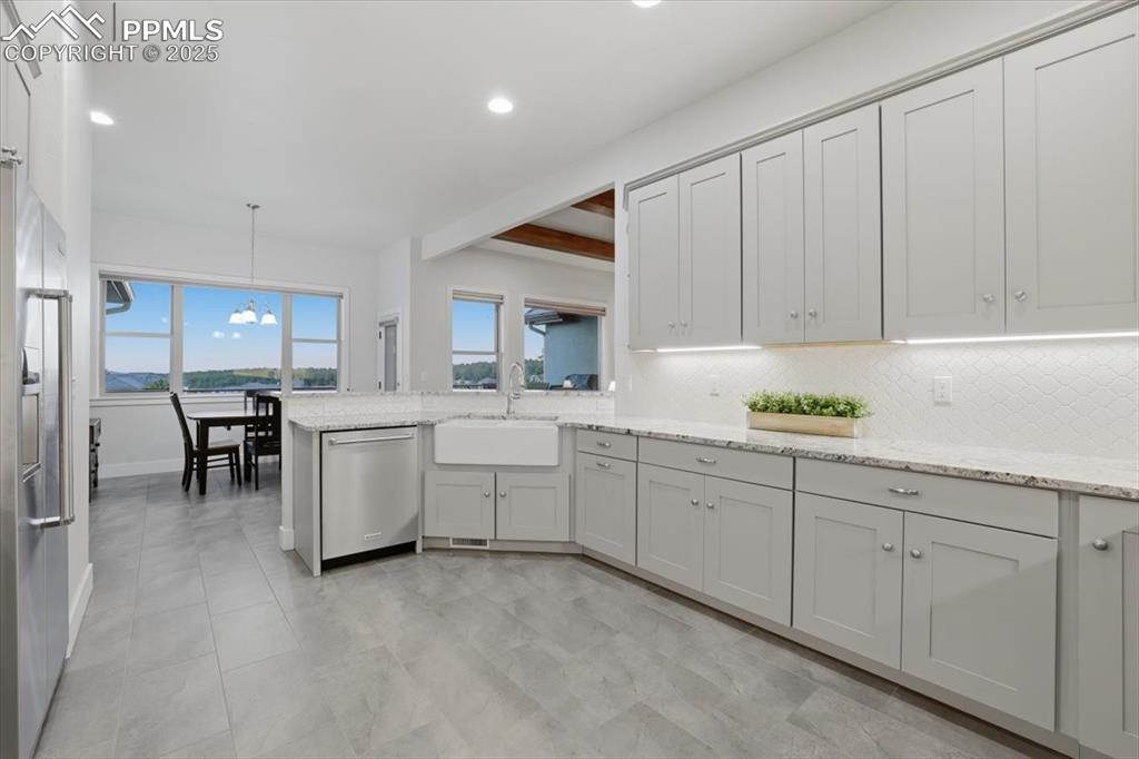 Image 15 of 49: This kitchen has generous counter space - room for all of your holiday meal