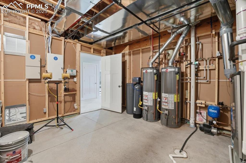 Image 47 of 49: The spacious mechanical room has even more room for storage in the basement
