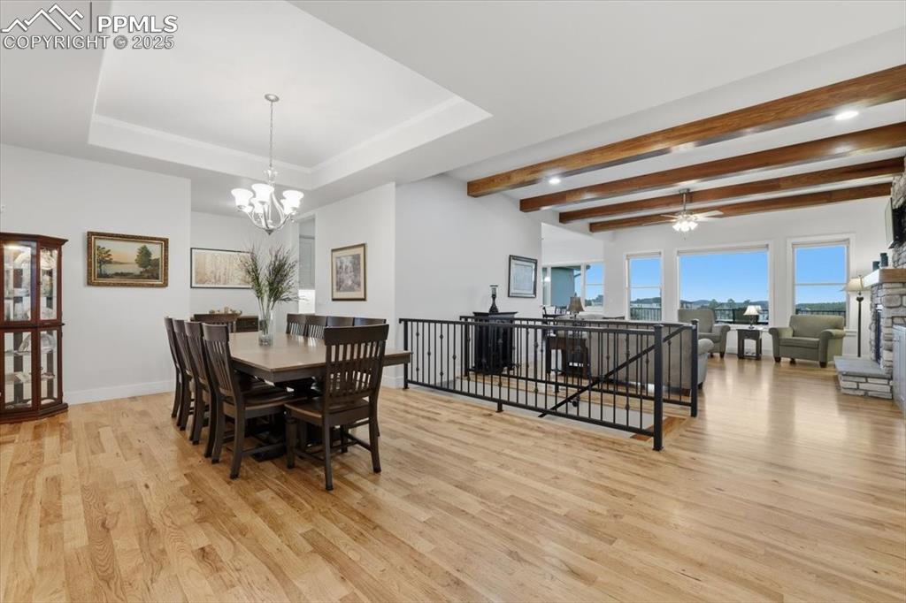 Image 7 of 49: The entry is open to the formal dining area and the great room along with t