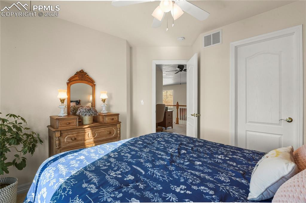 Image 33 of 41: Upper level 2nd bedroom.