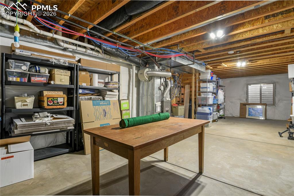 Image 38 of 41: Additional view of the unfinished basement.