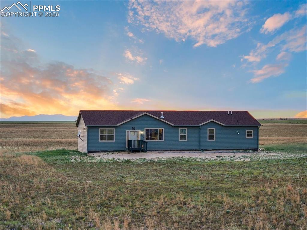 Image 2 of 30: View of front of house featuring a patio