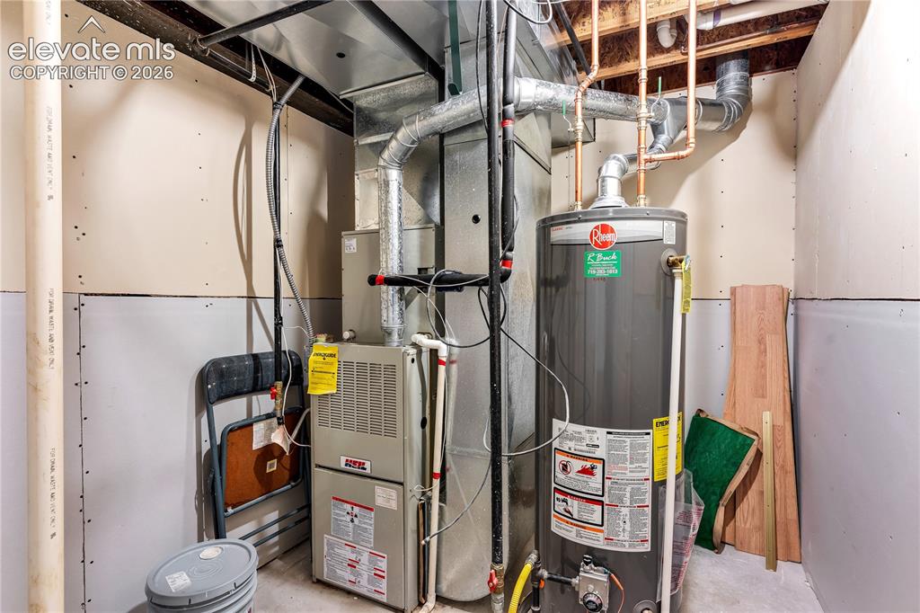 Image 25 of 32: Forced-air furnace and water heater installation