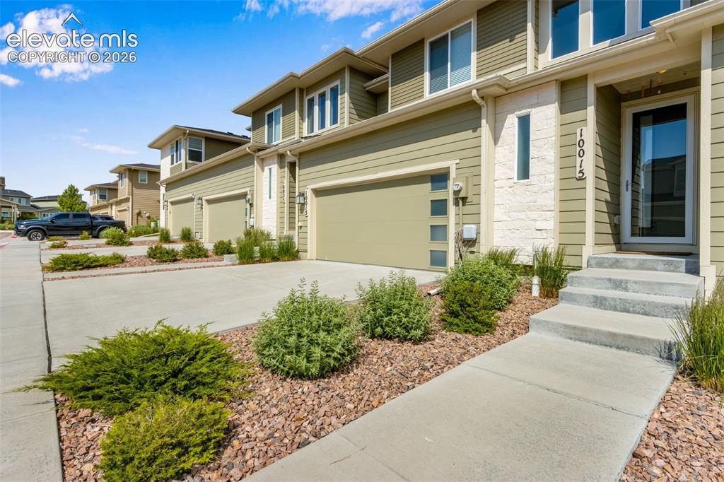 Image 1 of 34: Easy to maintain Front and Backyard with Automatic Sprinkler System.