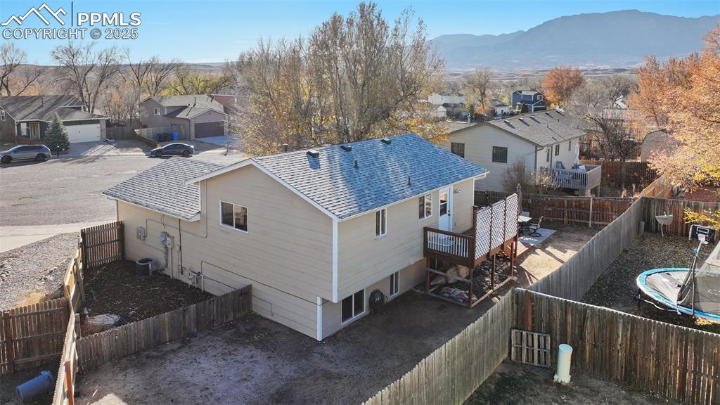 Image 6 of 23: Aerial perspective of area with a mountain backdrop