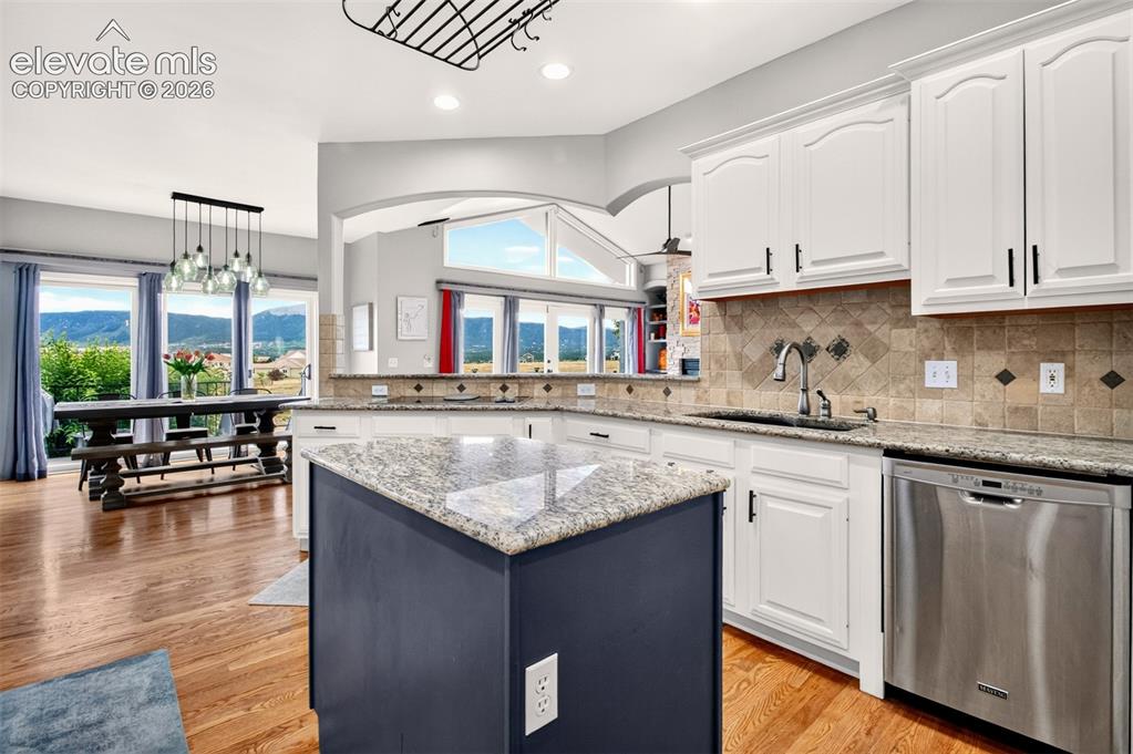 Image 10 of 43: Island and Double Oven