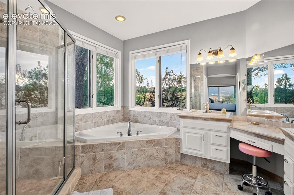 Image 21 of 43: Corner Jetted Tub and Custom Over Sized Shower